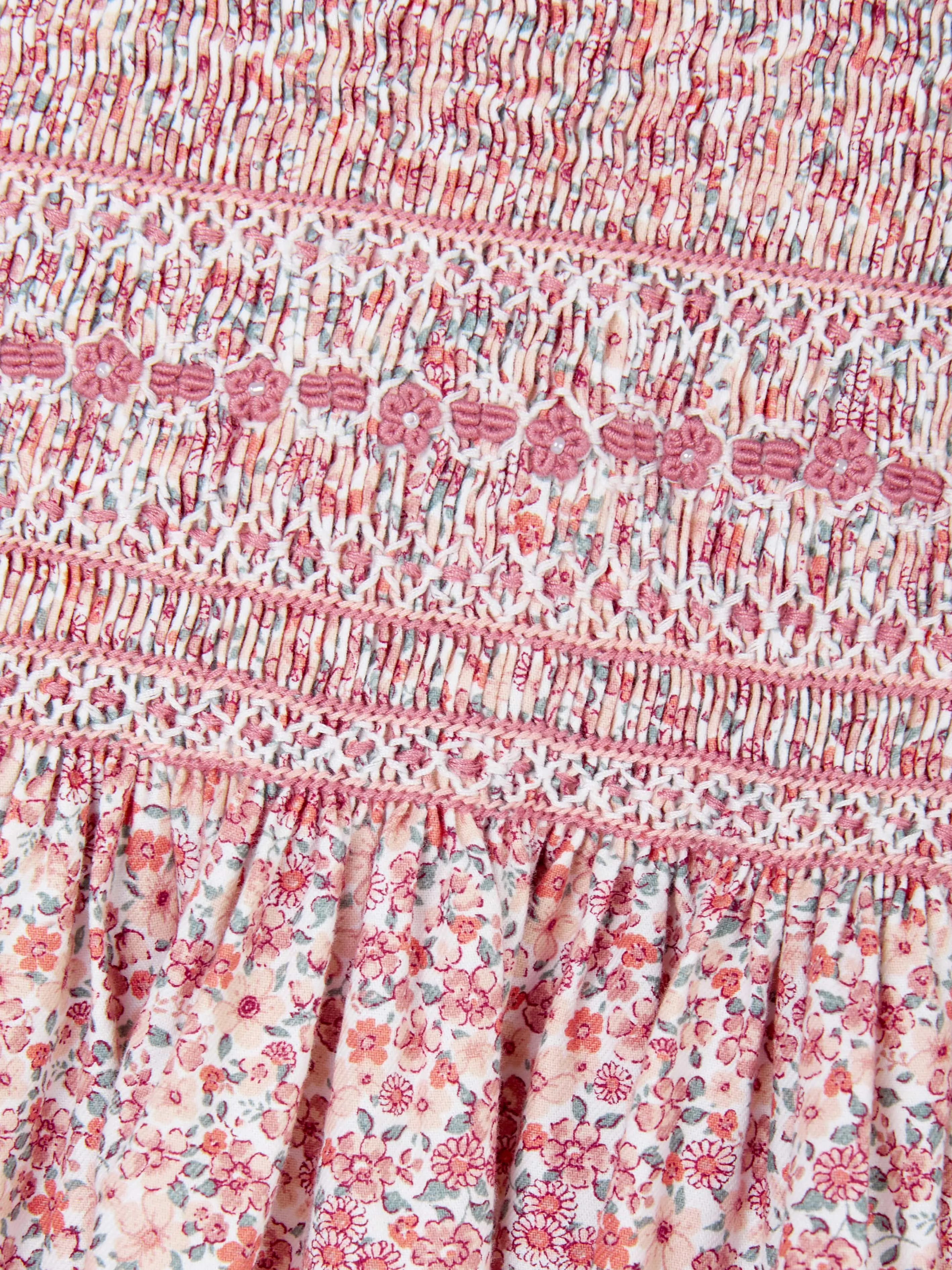Robe à smocks florale pour fille en rose