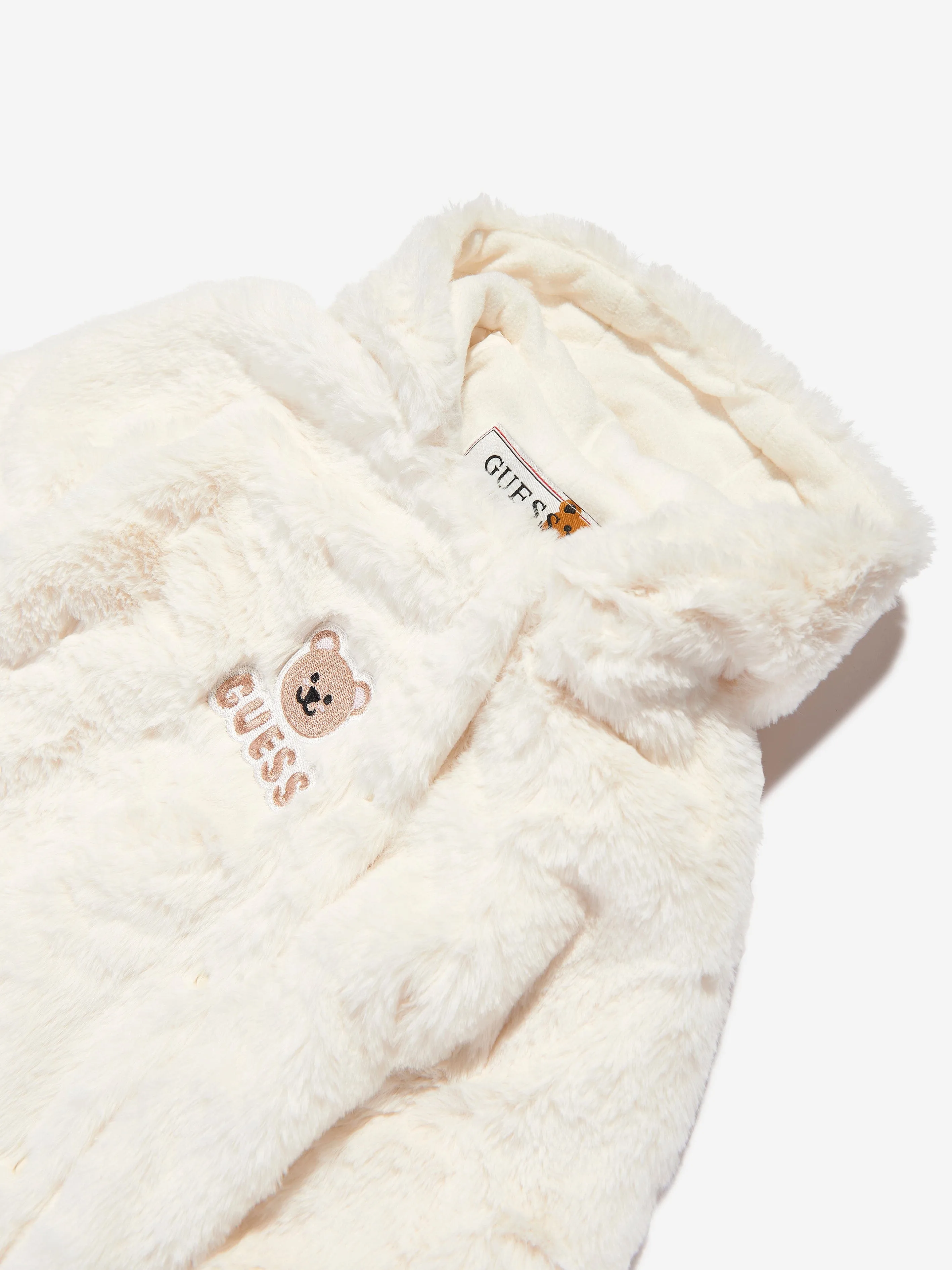 Combinaison de neige en fausse fourrure Guess Baby en ivoire